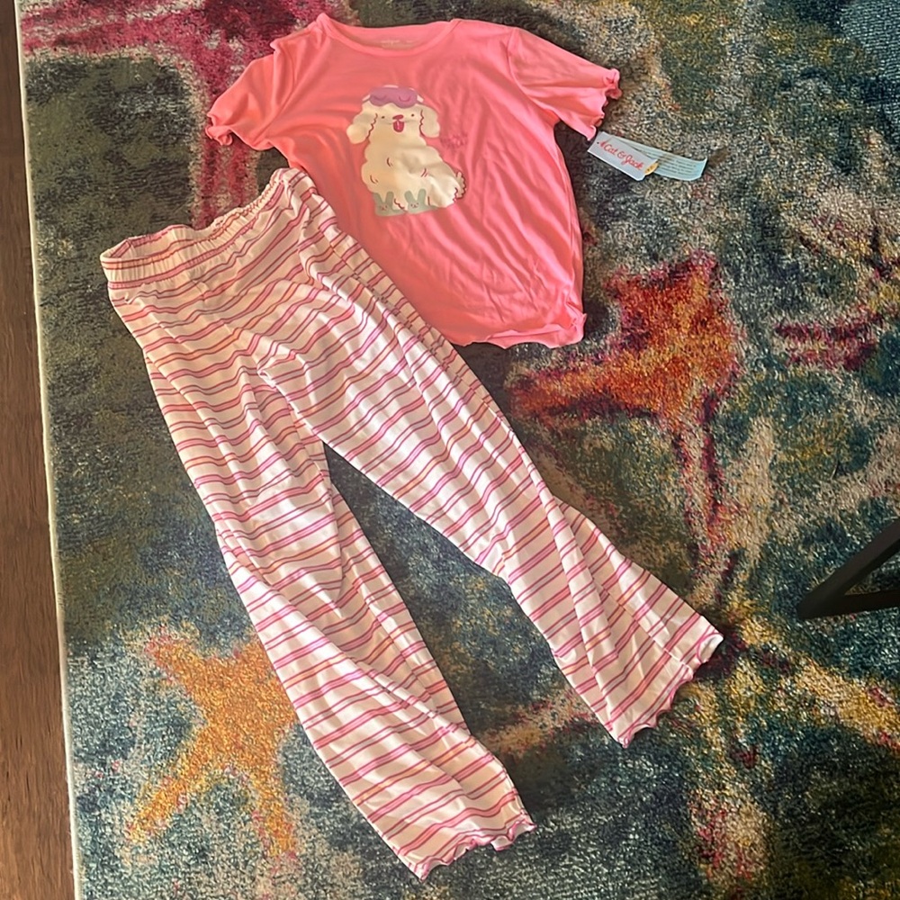 Puppy with bunny slippers on pj set